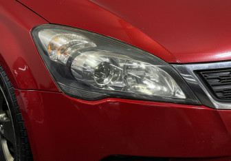 Подержанный автомобиль Kia Ceed Wagon 2011 года (13 фото)