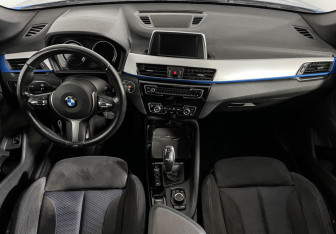 Подержанный автомобиль BMW X1 2018 года (11 фото)
