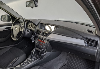 Подержанный автомобиль BMW X1 2014 года (13 фото)