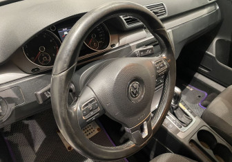 Подержанный автомобиль Volkswagen Passat Sedan 2011 года (13 фото)