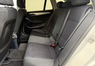 Подержанный автомобиль BMW X1 2014 года (11 фото)