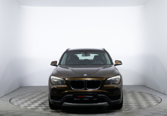 Подержанный автомобиль BMW X1 2013 года (2 фото)