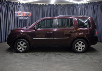 Подержанный автомобиль Honda Pilot 2013 года (8 фото)