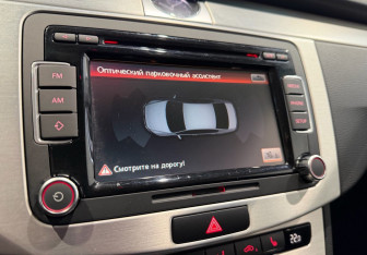 Подержанный автомобиль Volkswagen Passat Sedan 2013 года (17 фото)