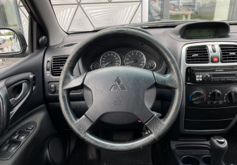 Подержанный автомобиль Mitsubishi Space Star Compactvan 2004 года (14 фото)