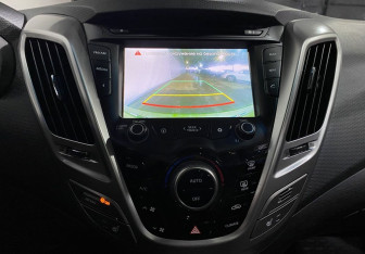 Подержанный автомобиль Hyundai Veloster 2013 года (14 фото)