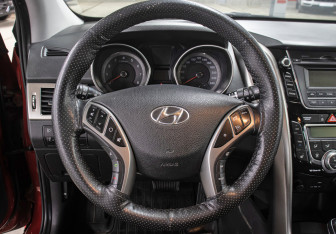 Подержанный автомобиль Hyundai i30 Hatchback 2015 года (17 фото)