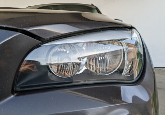 Подержанный автомобиль BMW X1 2014 года (11 фото)