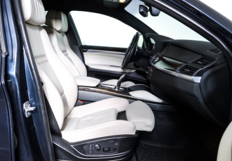 Подержанный автомобиль BMW X6 2013 года (11 фото)