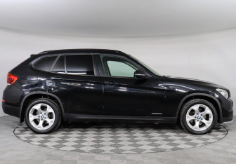 Подержанный автомобиль BMW X1 2014 года (6 фото)