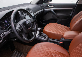 Подержанный автомобиль Skoda Octavia Liftback 2013 года (10 фото)