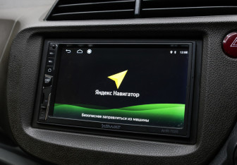 Подержанный автомобиль Honda Fit Shuttle 2012 года (19 фото)