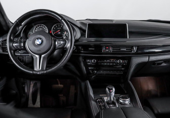 Подержанный автомобиль BMW X6 M 2015 года (12 фото)
