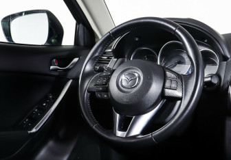 Подержанный автомобиль Mazda CX-5 2016 года (13 фото)