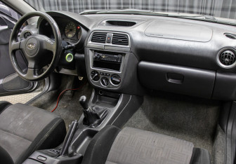 Подержанный автомобиль Subaru Impreza Wagon 2004 года (7 фото)