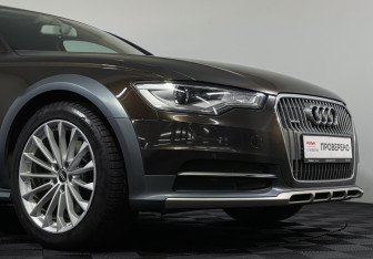 Подержанный автомобиль Audi A6 allroad 2014 года (20 фото)