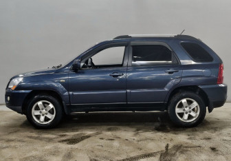 Подержанный автомобиль Kia Sportage 2009 года (8 фото)