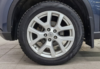 Подержанный автомобиль Nissan X-Trail 2011 года (12 фото)