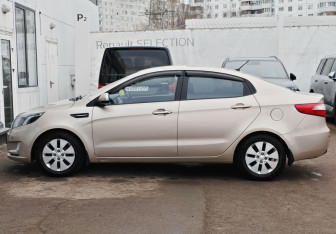 Подержанный автомобиль Kia Rio Sedan 2014 года (8 фото)