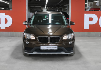 Подержанный автомобиль BMW X1 2014 года (2 фото)