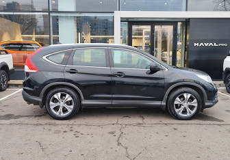 Подержанный автомобиль Honda CR-V 2013 года (4 фото)