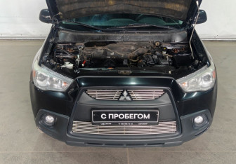 Подержанный автомобиль Mitsubishi ASX 2011 года (9 фото)