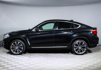 Подержанный автомобиль BMW X6 2015 года (8 фото)