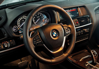 Подержанный автомобиль BMW X4 2015 года (12 фото)