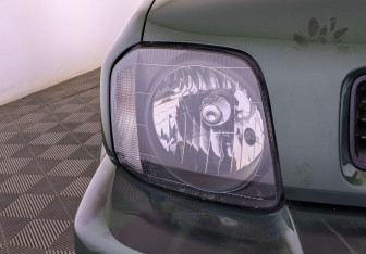 Подержанный автомобиль Suzuki Jimny 2011 года (11 фото)