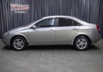 Подержанный автомобиль Nissan Primera Sedan 2003 года (8 фото)