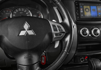 Подержанный автомобиль Mitsubishi Pajero Sport 2014 года (16 фото)
