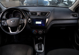 Подержанный автомобиль Kia Rio Sedan 2014 года (11 фото)
