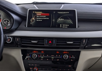 Подержанный автомобиль BMW X6 2015 года (17 фото)