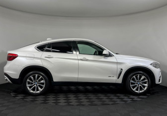 Подержанный автомобиль BMW X6 2016 года (6 фото)