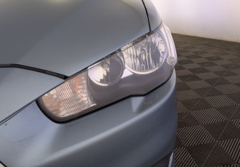 Подержанный автомобиль Mitsubishi Lancer Sedan 2011 года (11 фото)