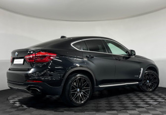 Подержанный автомобиль BMW X6 2017 года (2 фото)