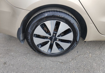 Подержанный автомобиль Kia Rio Sedan 2014 года (10 фото)