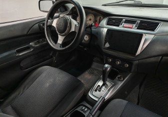 Подержанный автомобиль Mitsubishi Lancer Sedan 2006 года (10 фото)