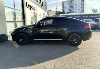Подержанный автомобиль BMW X6 2012 года (8 фото)