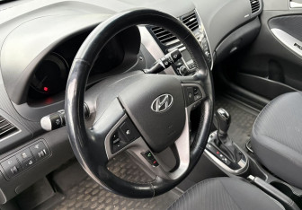 Подержанный автомобиль Hyundai Solaris Sedan 2014 года (14 фото)