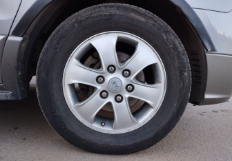 Подержанный автомобиль Hyundai Grand Starex 2011 года (14 фото)