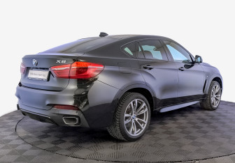 Подержанный автомобиль BMW X6 2018 года (5 фото)
