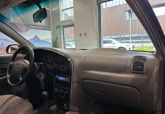 Подержанный автомобиль Kia Spectra Sedan 2008 года (10 фото)