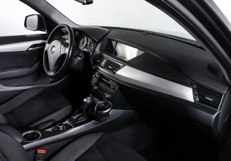 Подержанный автомобиль BMW X1 2014 года (11 фото)