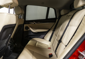 Подержанный автомобиль BMW X4 2016 года (13 фото)