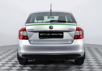 Подержанный автомобиль Skoda Rapid Liftback 2014 года (6 фото)