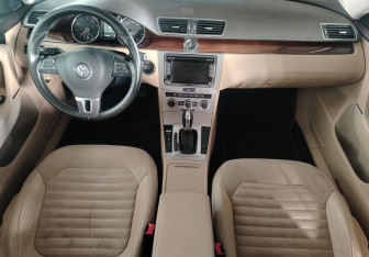 Подержанный автомобиль Volkswagen Passat Sedan 2011 года (11 фото)