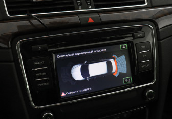 Подержанный автомобиль Skoda Superb Liftback 2013 года (13 фото)