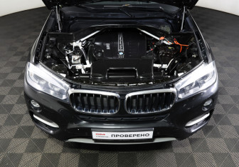 Подержанный автомобиль BMW X6 2015 года (9 фото)