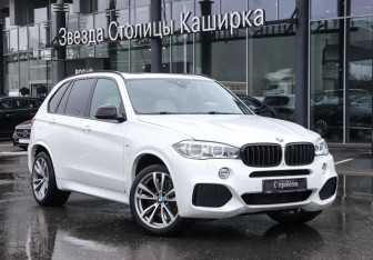 Подержанный автомобиль BMW X5 2016 года (23 фото)